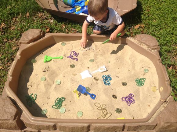 kids in a sandbox drawing