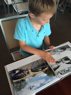 Tyler loved looking through the Then and Now Book and referring to it throughout the cruise!