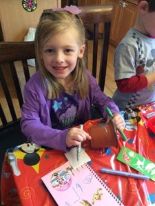 This princess had a great time decorating her flower pot!