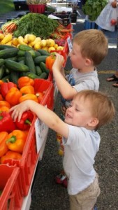 Boys at Farmers Market with Peppers